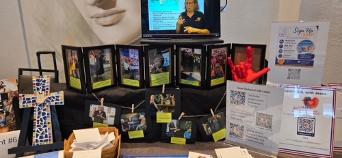 ASL Jesus Signs Workshops table at convention