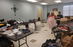 volunteers sorting donations