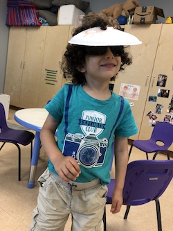 child wearing hat