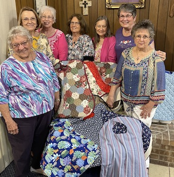 Women with items for nursing home