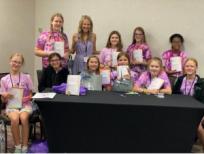 Teens with books from author Christina Hergenrader