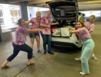 teens loading car